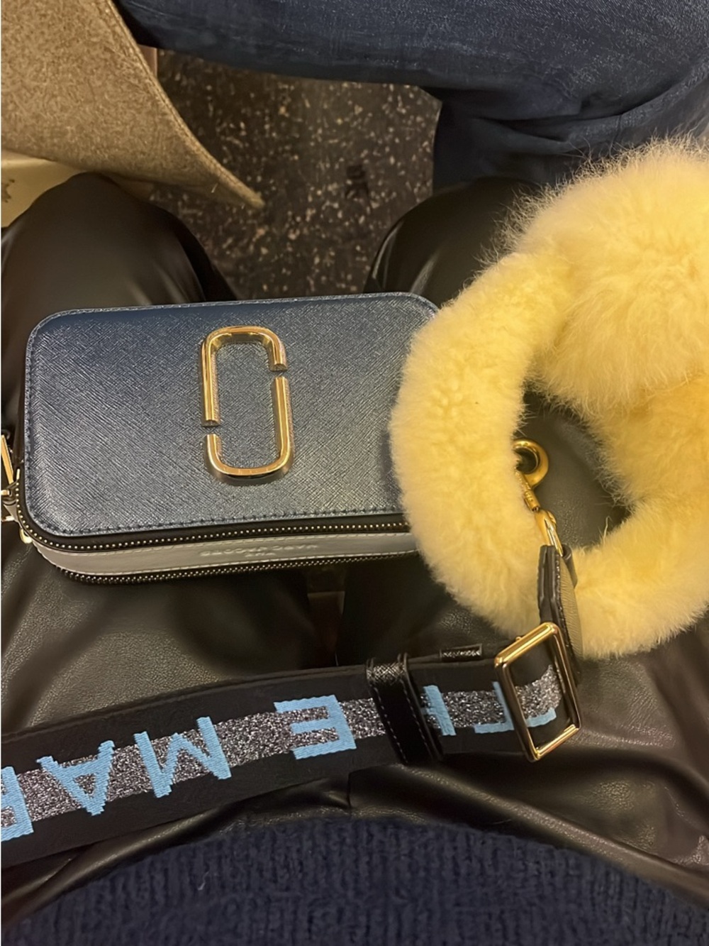 Black Crossbody Camera Bag with Gold Hardware and Yellow Shearling Handle